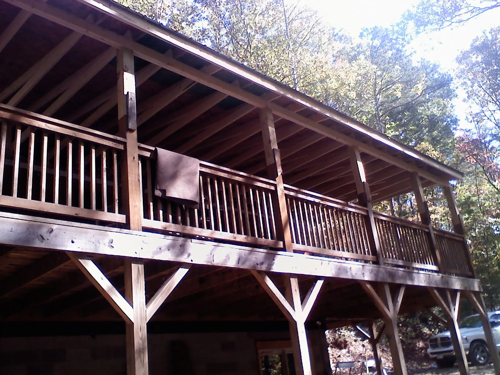 Timber framing under a new elevated porch and deck — Roof Leak Repair in Morgantown by Roofing Brothers